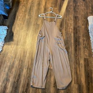 Overall style jump suit. Worn once! Sold as pictured, great condition!